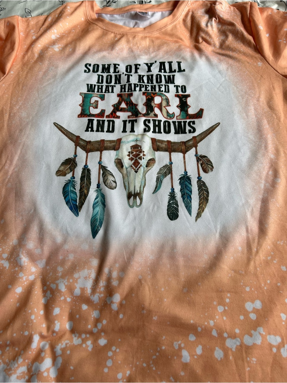 Graphic Tee with Bone & Feather Design - Peach White